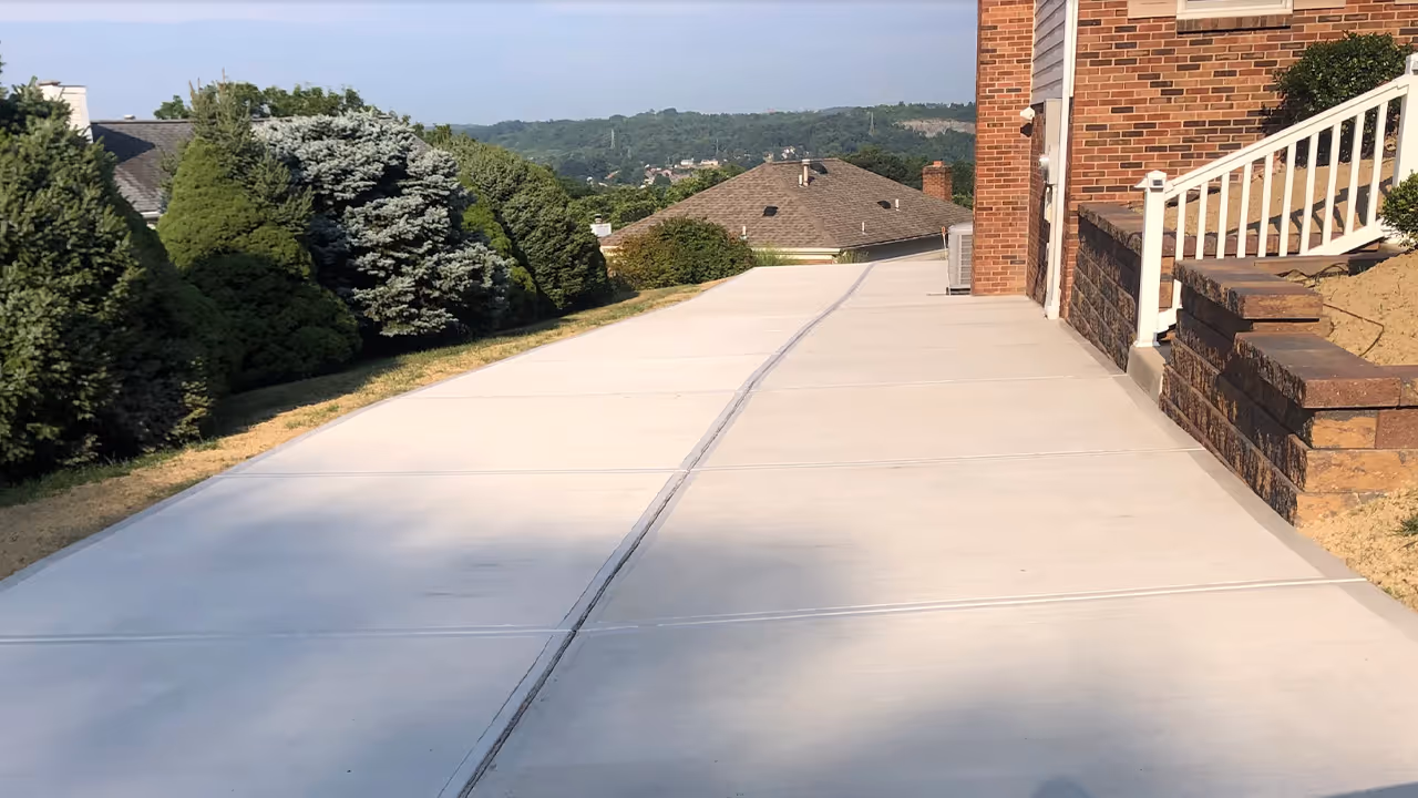 New concrete driveway on a Pittsburgh hillside property